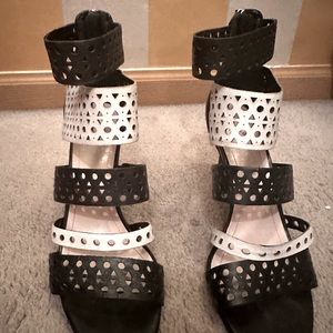 Black and white sandal 3 inch heel in good condition worn once. By Vince Camuto.